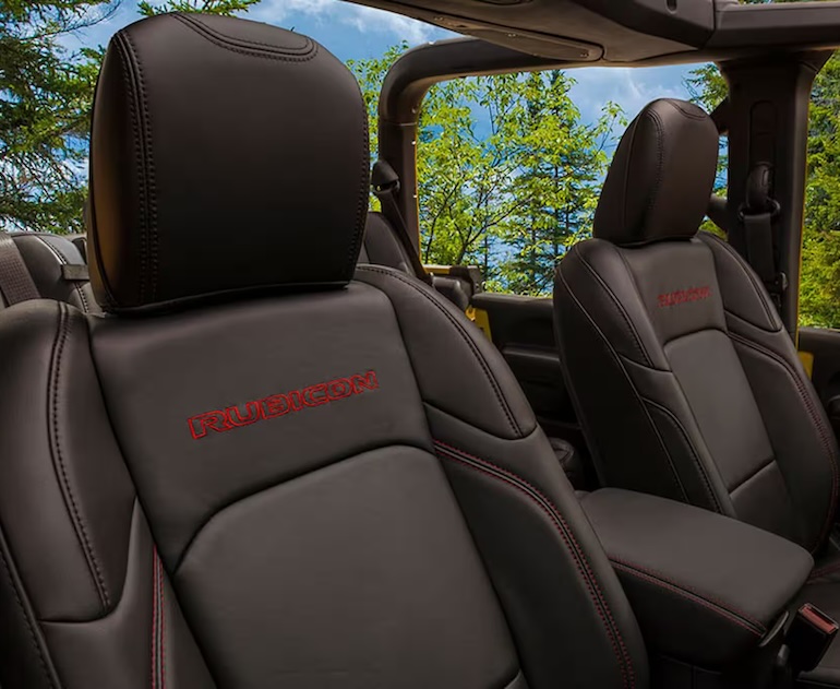 The 2026 Jeep Gladiator is a four-door midsize pickup truck with removable doors, roof panels, and a five-foot cargo bed.